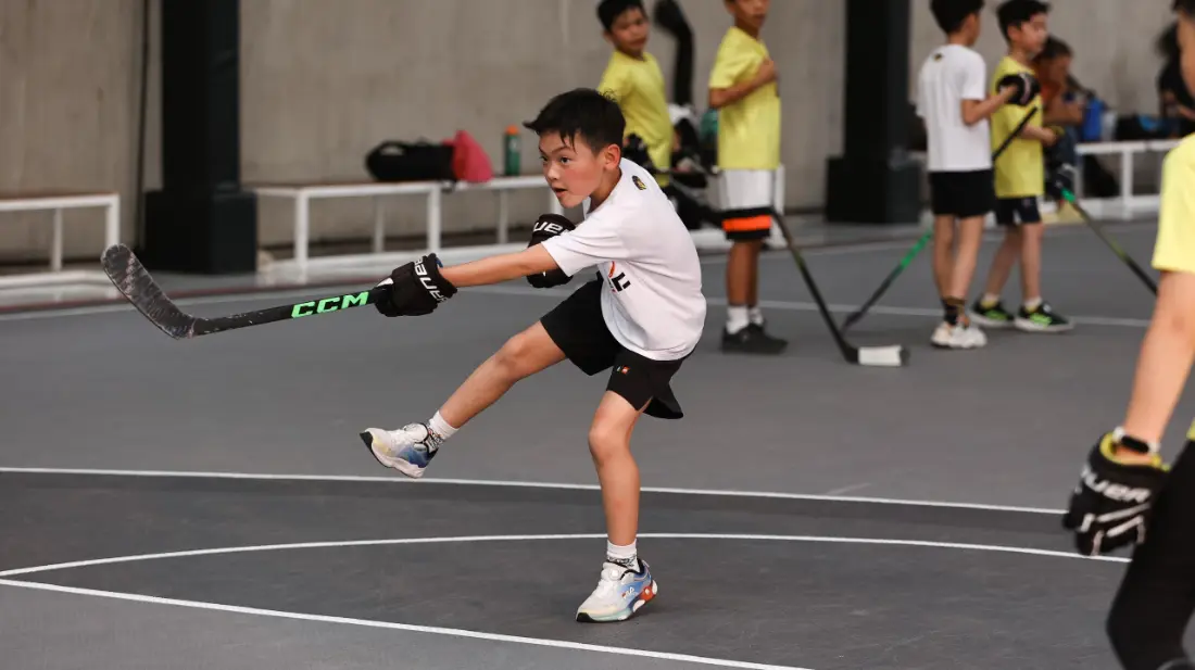 A player shooting during an inline hockey practice