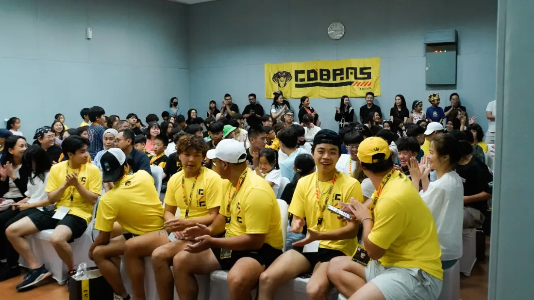 Campers gathered in a classroom session at COBRA/CAMP